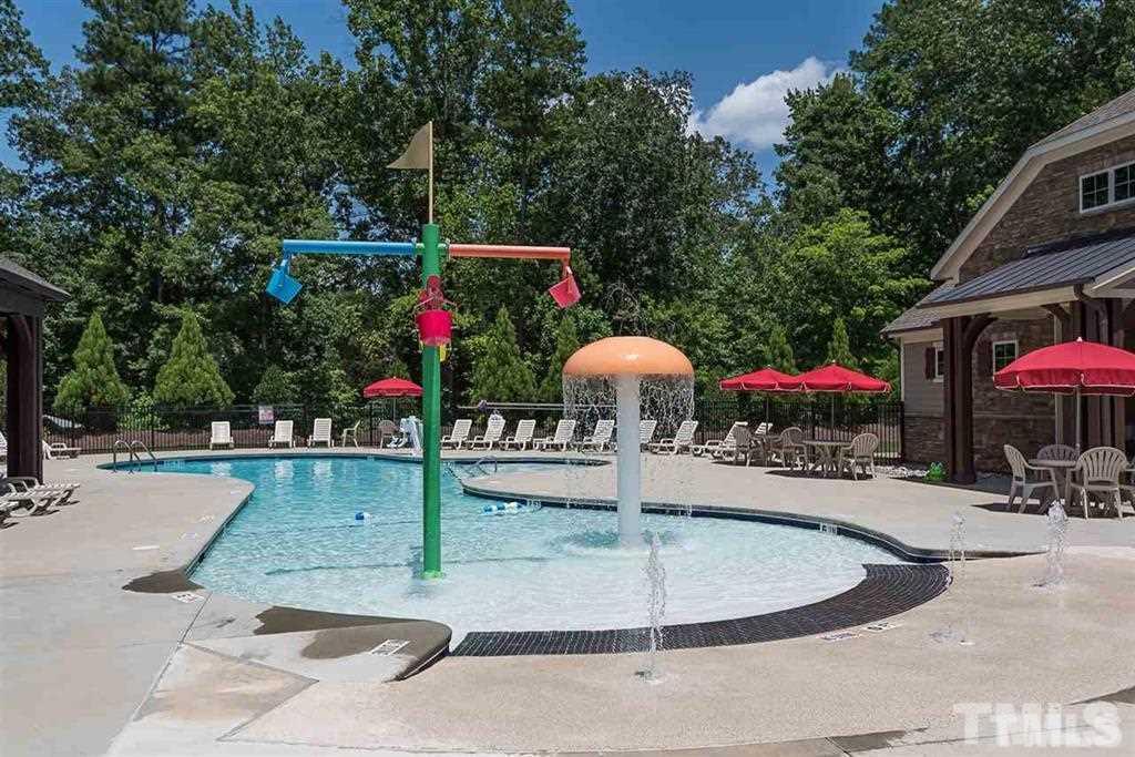 721 Wickham Ridge Road Apex, NC 27539 - Photo 22 of 25 a view of outdoor space patio and swimming pool