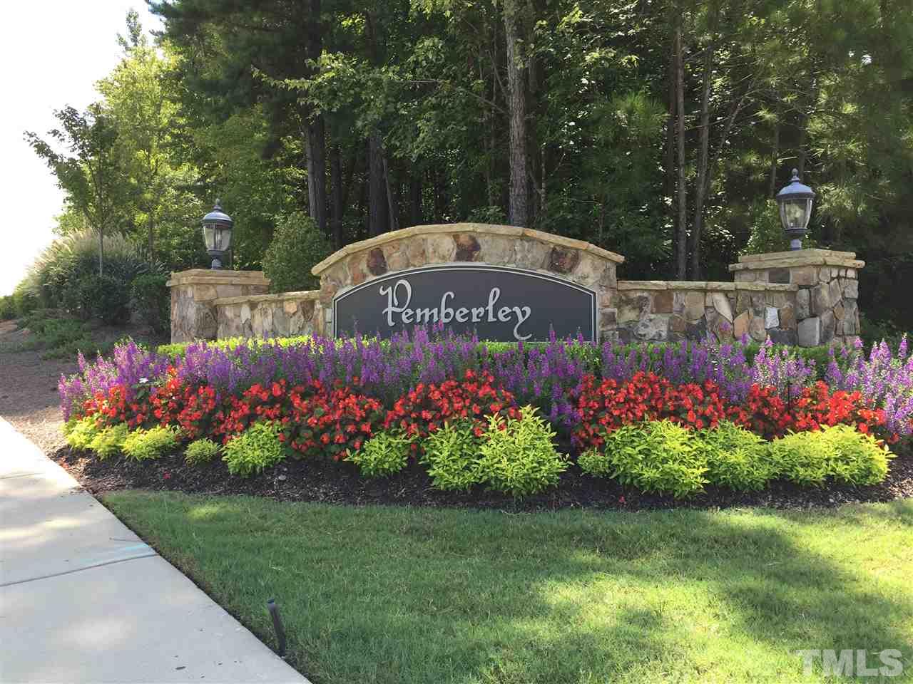 721 Wickham Ridge Road Apex, NC 27539 - Photo 25 of 25 a sign that is in front of flowers