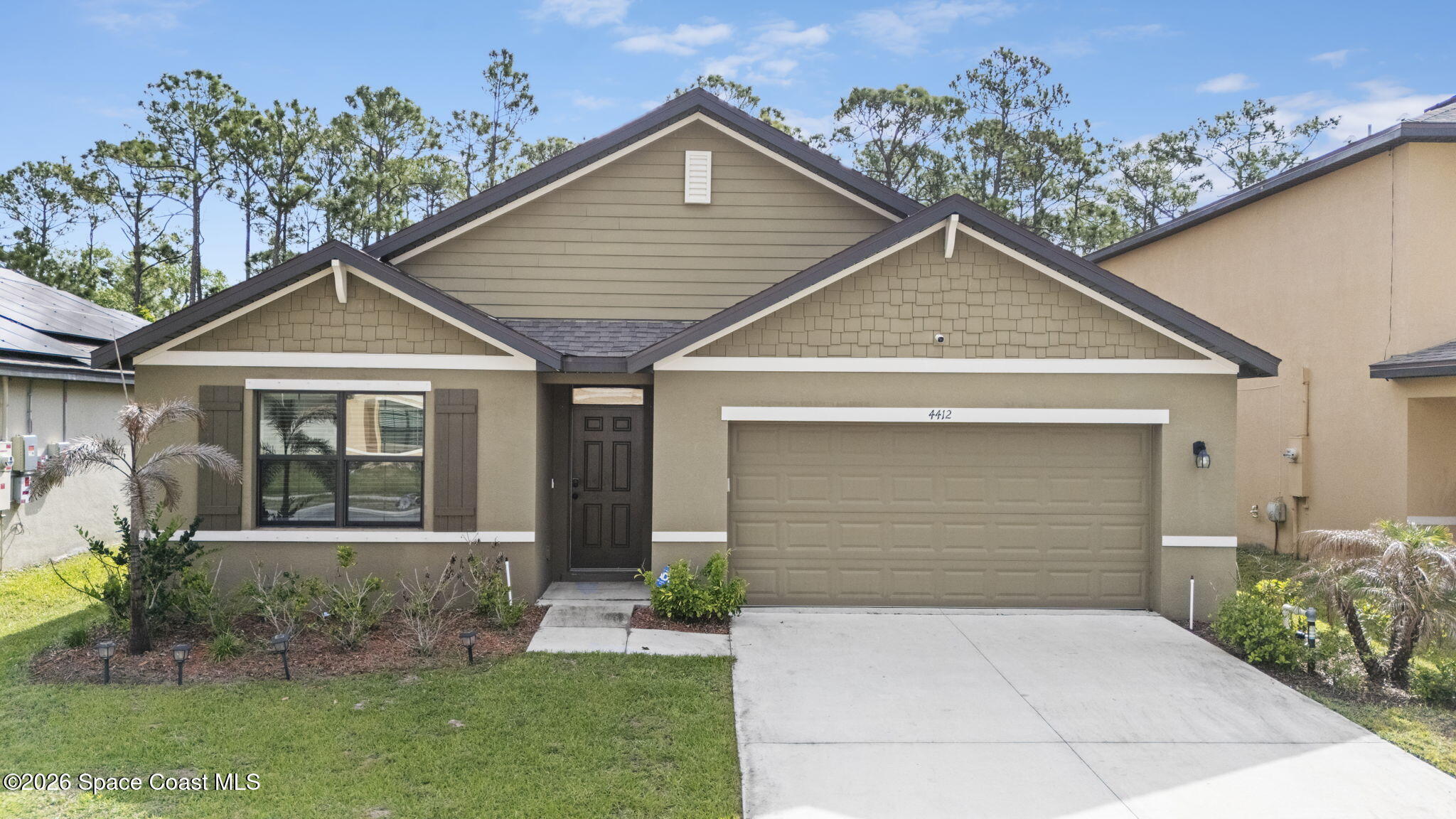 4412 Talbot Boulevard Cocoa, FL 32926 - Photo 2 of 32 a front view of a house with garden