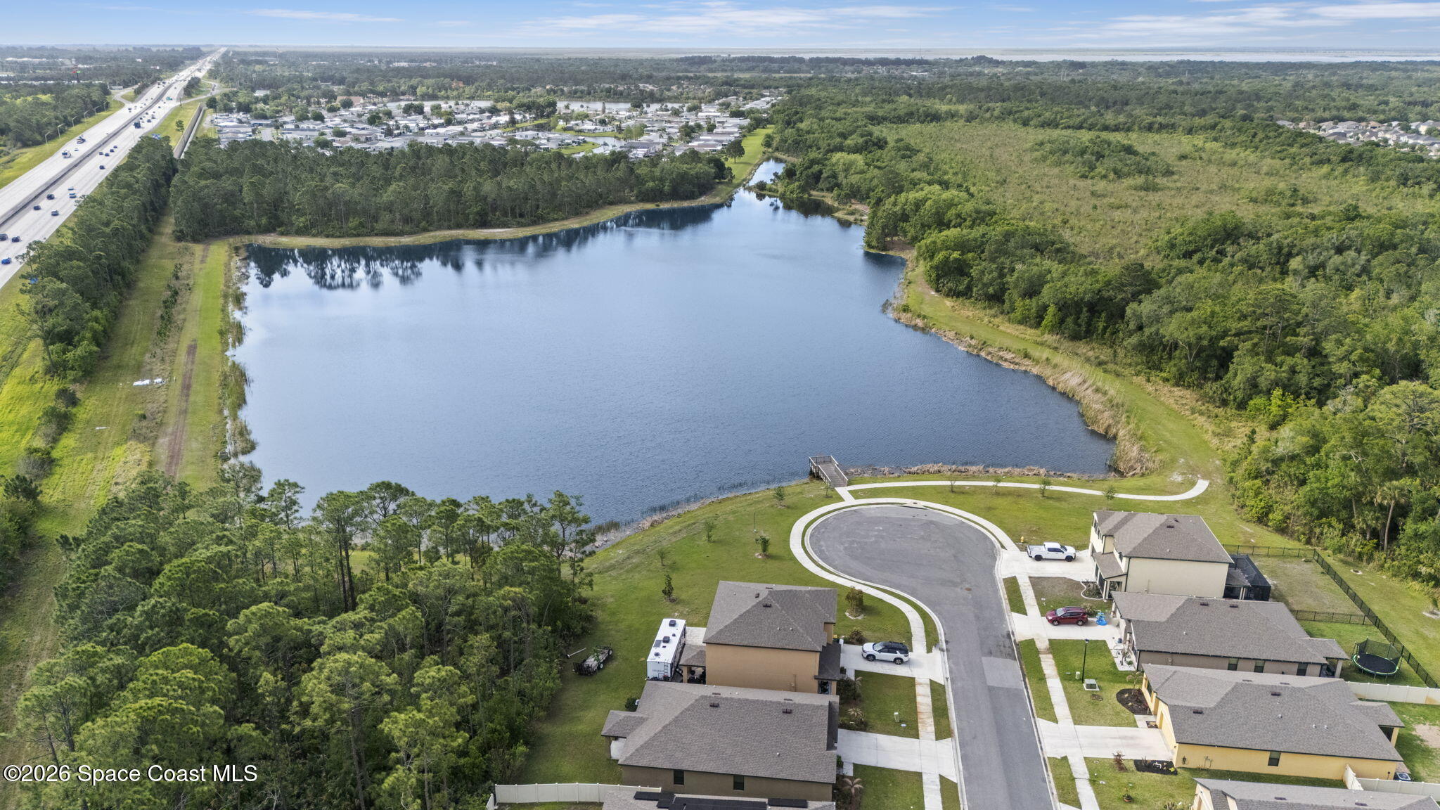4412 Talbot Boulevard Cocoa, FL 32926 - Photo 31 of 32 an aerial view of a house with outdoor space and a lake view