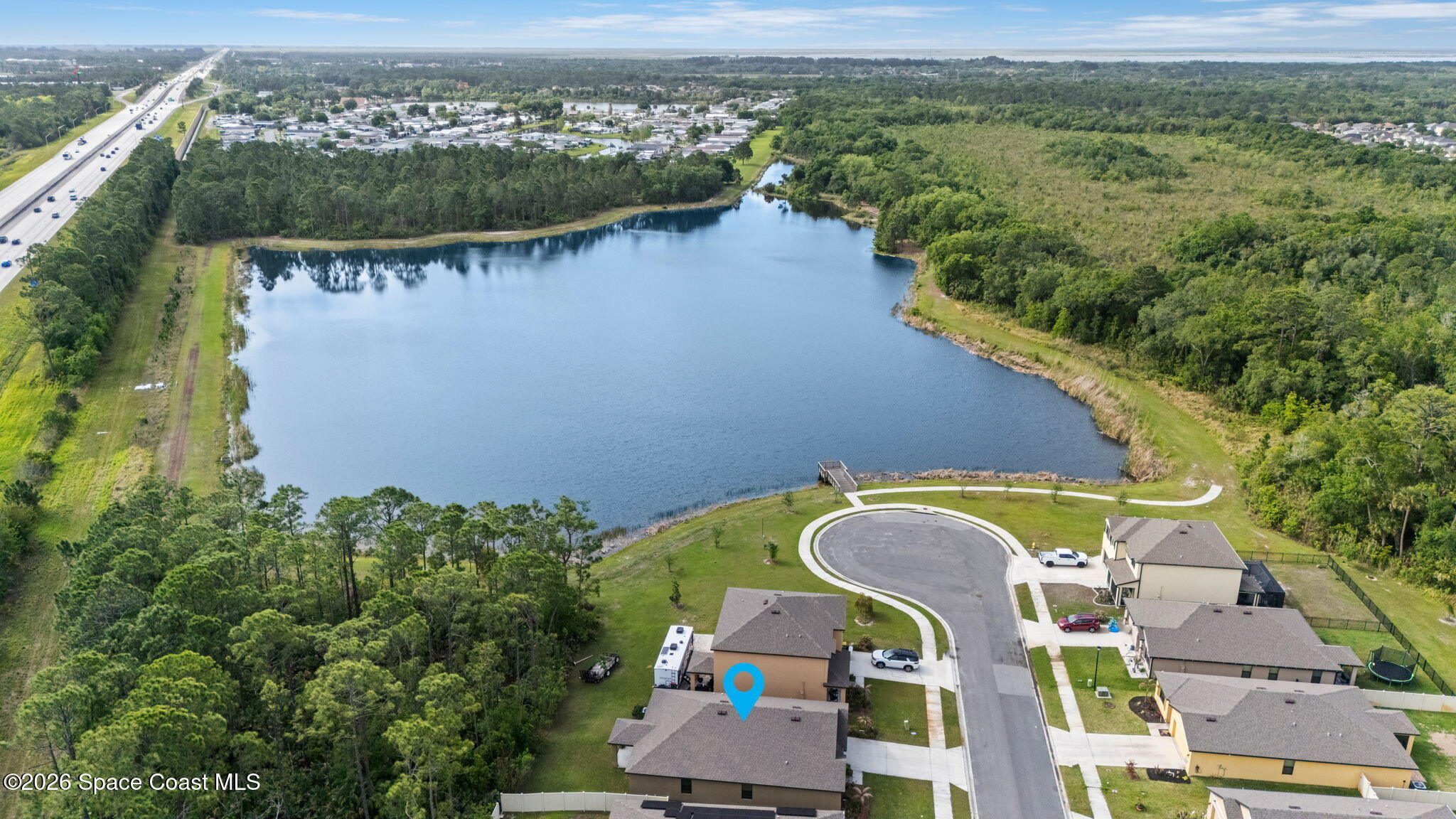 4412 Talbot Boulevard Cocoa, FL 32926 - Photo 32 of 32 an aerial view of a house with outdoor space and a lake view