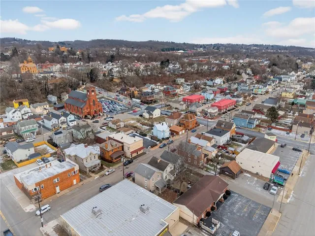 an aerial view of a city with lots of residential buildings
