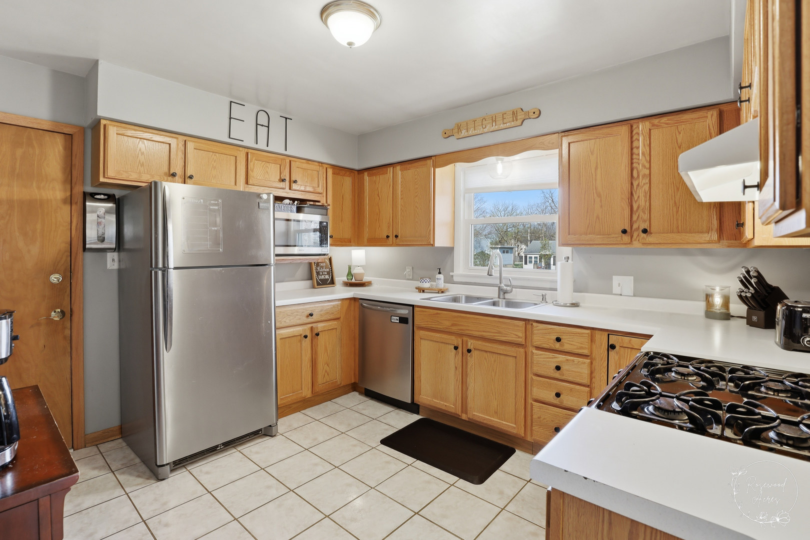 175 North Elm Street Herscher, IL 60941 - Photo 5 of 22 a kitchen with stainless steel appliances a refrigerator sink and cabinets