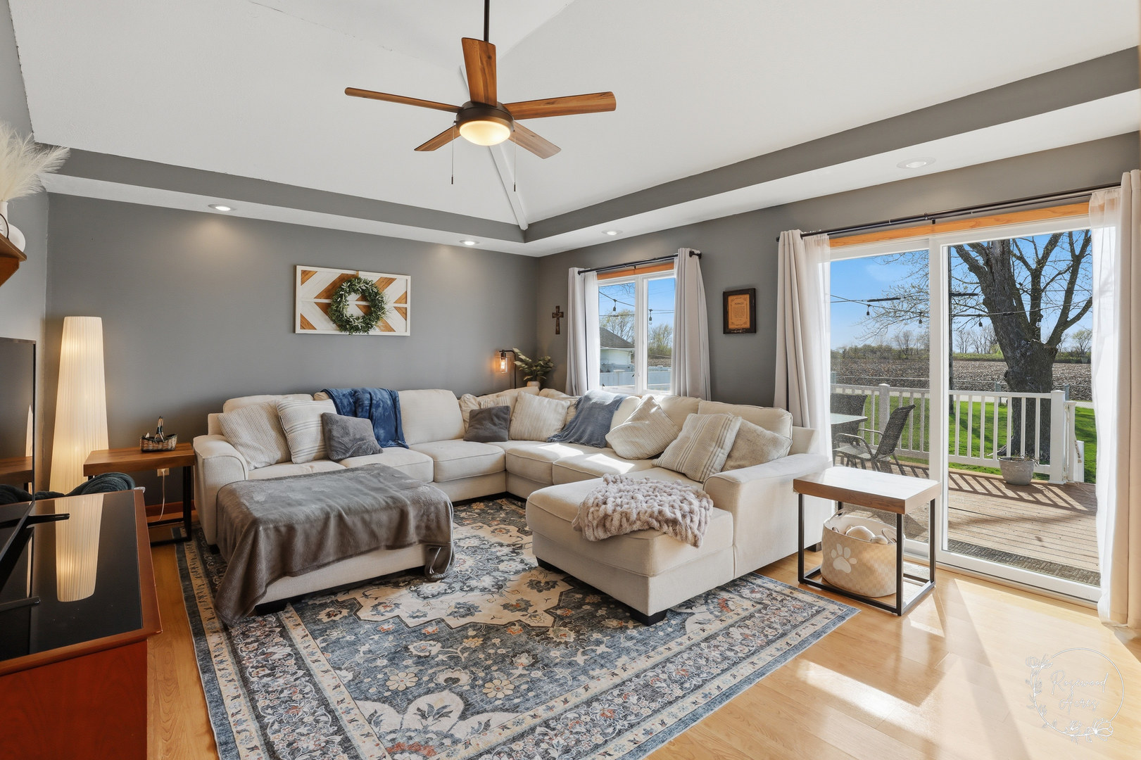175 North Elm Street Herscher, IL 60941 - Photo 7 of 22 a living room with a couch and a chandelier