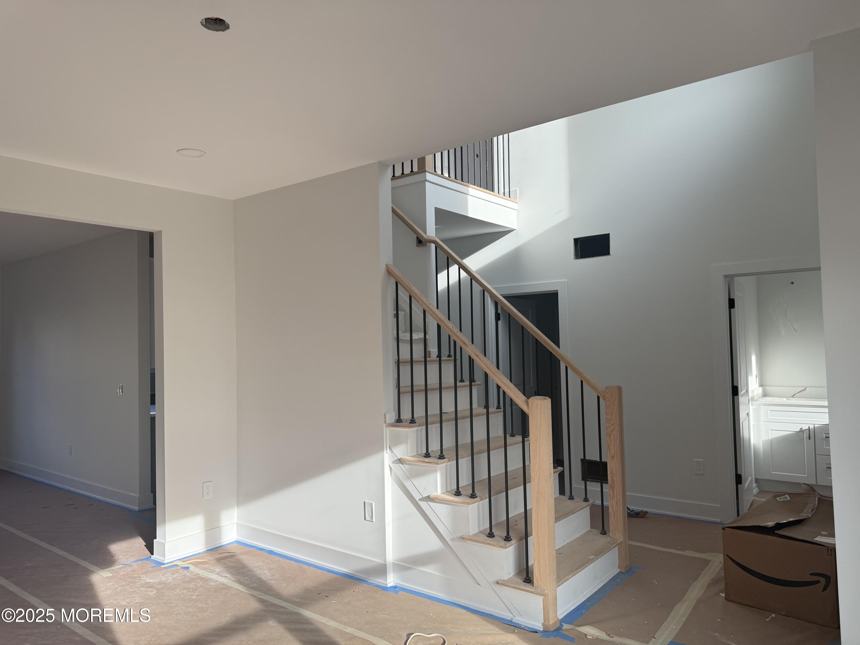 68 Main Street Manalapan, NJ 07726 - Photo 16 of 24 a view of entryway and hall with wooden floor
