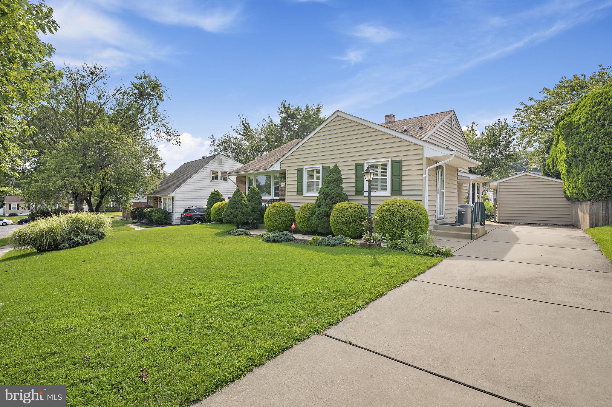 9004 Tammy Road Baltimore, MD 21236 - Photo 3 of 27 Charming home with lush green lawn.