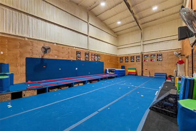a view of a room with gym equipment