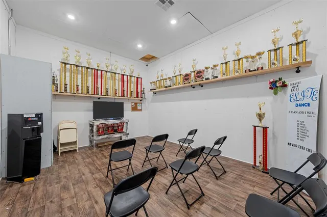 a view of a dining room with furniture