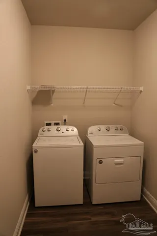 a view of a backyard with a patio