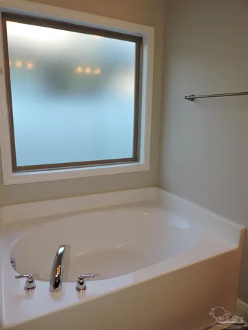 a bathroom with a bathtub