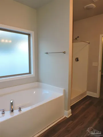 a bathroom with a bathtub