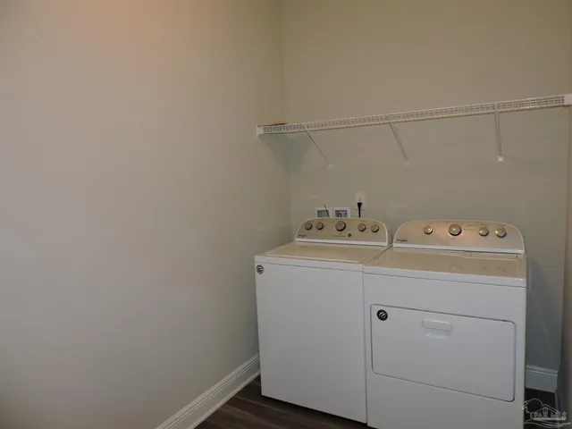 an empty room with a empty space and windows