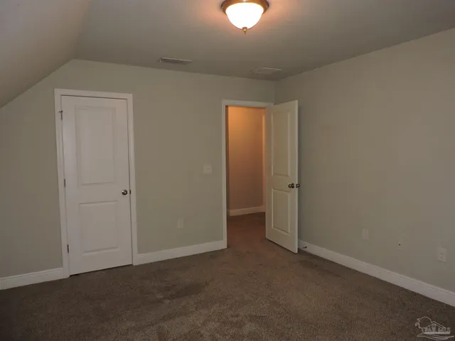 an empty room with a workbench