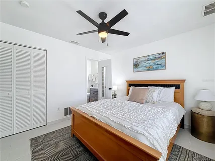 a bathroom with a sink toilet and a mirror
