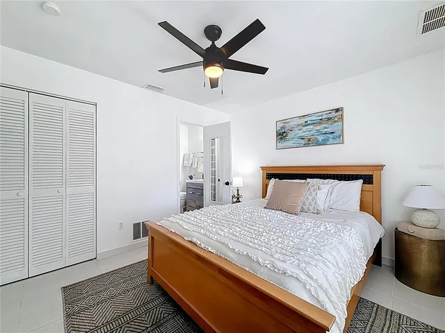 a bathroom with a sink toilet and a mirror