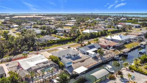 an aerial view of a city with lots of residential buildings