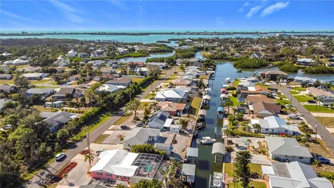 an aerial view of residential building with parking space