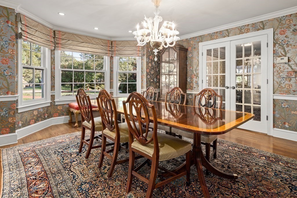 84 Old Colony Road Wellesley, MA 02481 - Photo 11 of 39 a view of a dining room with furniture wooden floor and chandelier