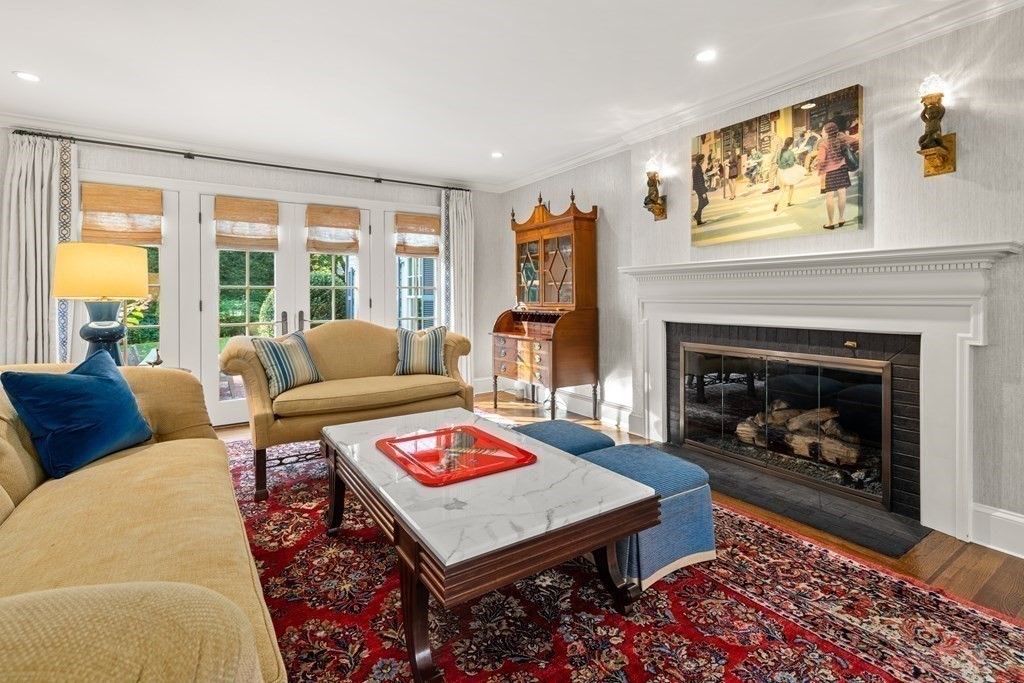 84 Old Colony Road Wellesley, MA 02481 - Photo 12 of 39 a living room with furniture and a fireplace