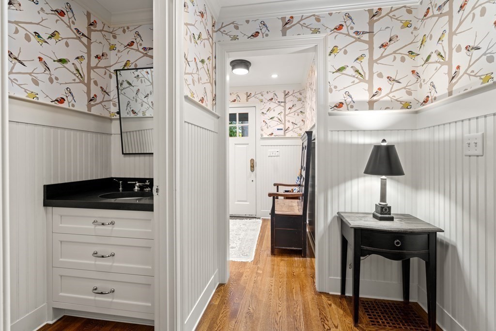 84 Old Colony Road Wellesley, MA 02481 - Photo 16 of 39 a view of a hallway with wooden floor and workspace
