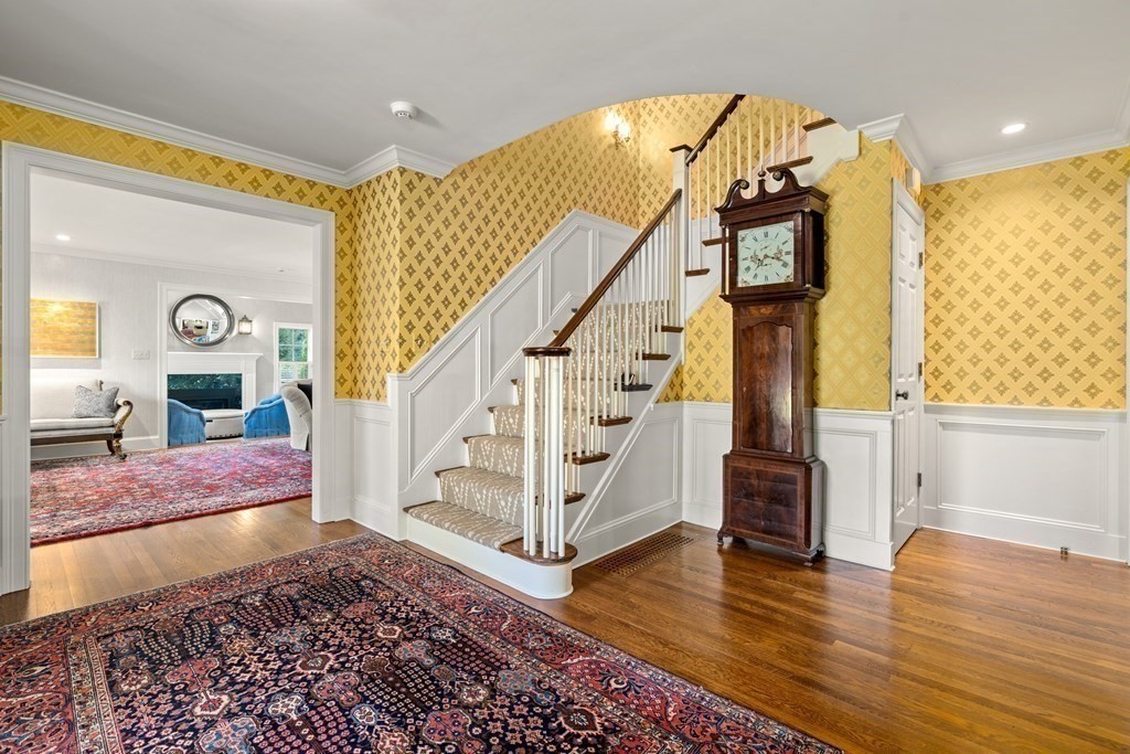 84 Old Colony Road Wellesley, MA 02481 - Photo 18 of 39 a view of entryway and hall with wooden floor