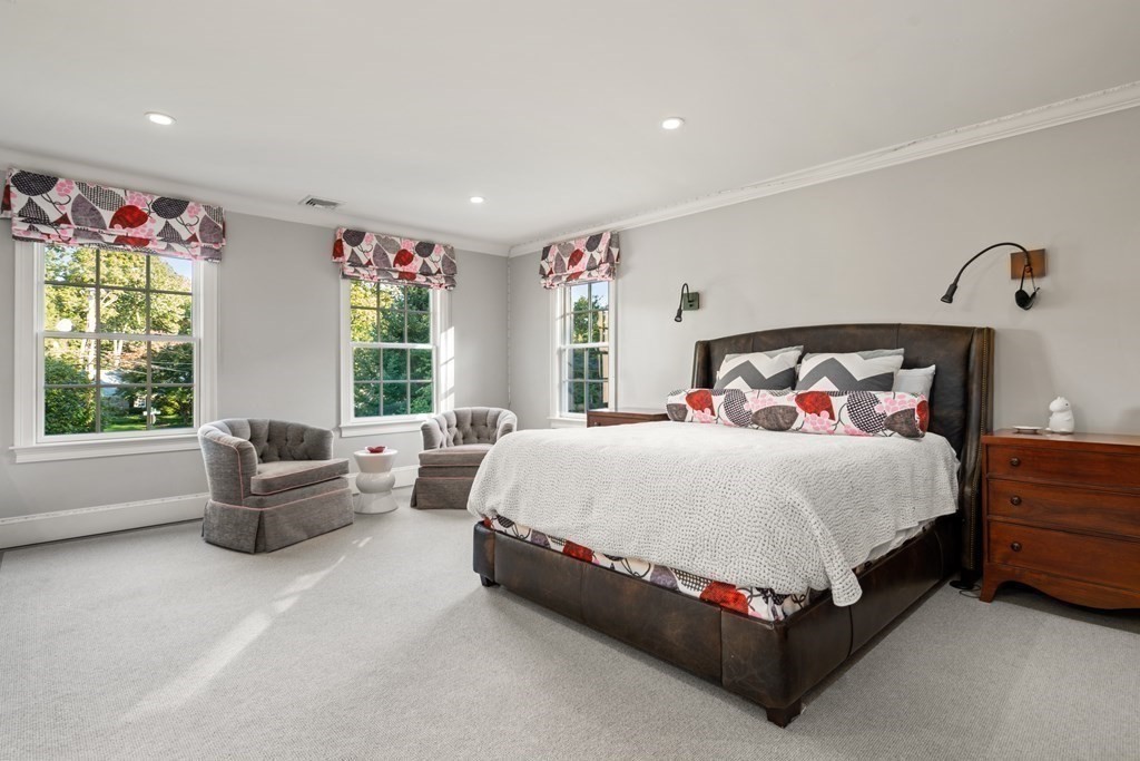 84 Old Colony Road Wellesley, MA 02481 - Photo 23 of 39 a spacious bedroom with a bed and a couch