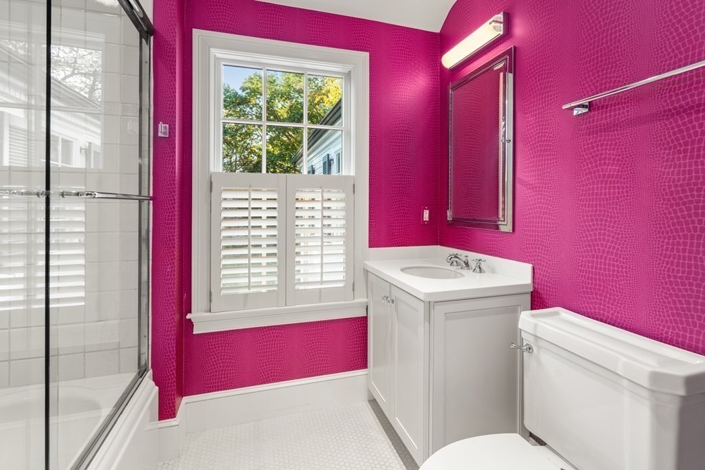 84 Old Colony Road Wellesley, MA 02481 - Photo 24 of 39 a bathroom with a bath tub sink mirror vanity and next to a window
