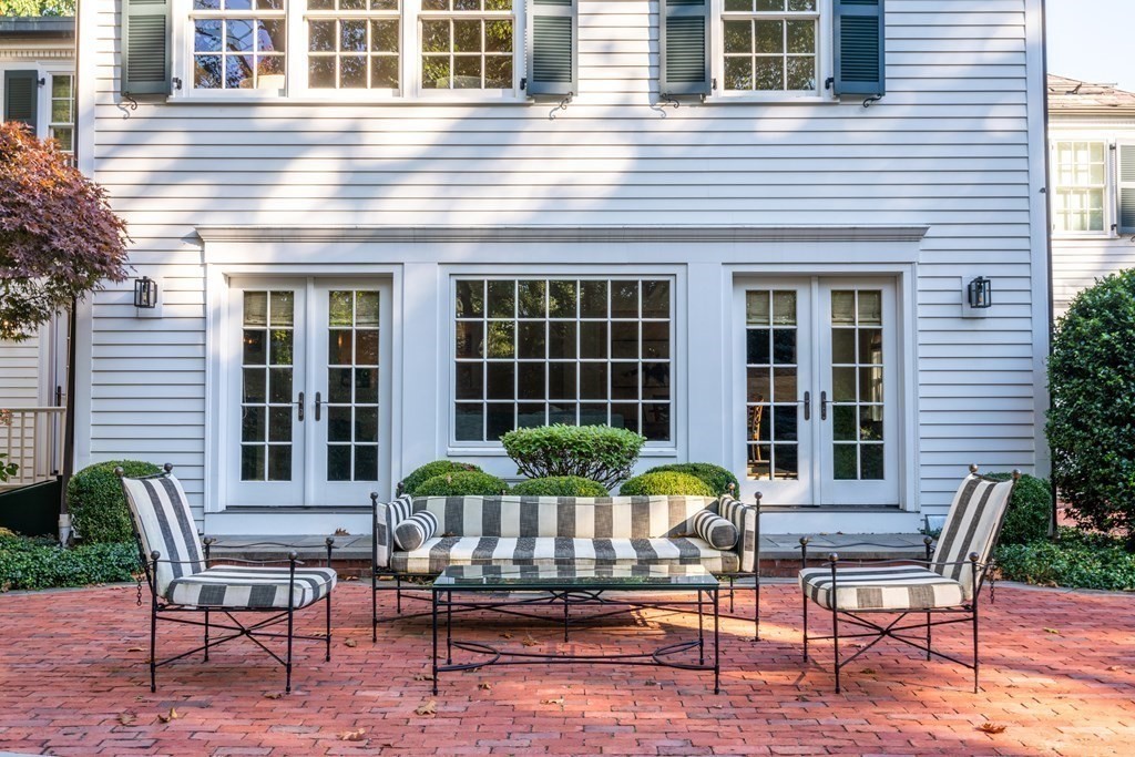 84 Old Colony Road Wellesley, MA 02481 - Photo 36 of 39 a house view with a seating space and garden