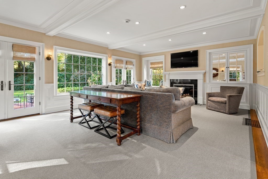 84 Old Colony Road Wellesley, MA 02481 - Photo 4 of 39 a living room with furniture and a flat screen tv