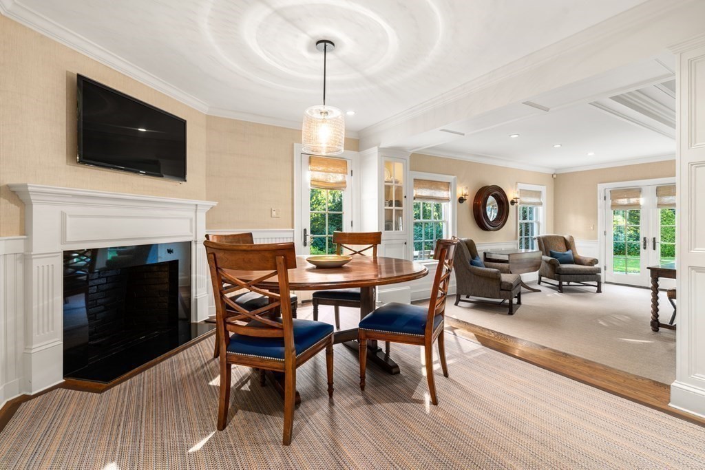 84 Old Colony Road Wellesley, MA 02481 - Photo 6 of 39 a living room with furniture a fireplace and a flat screen tv