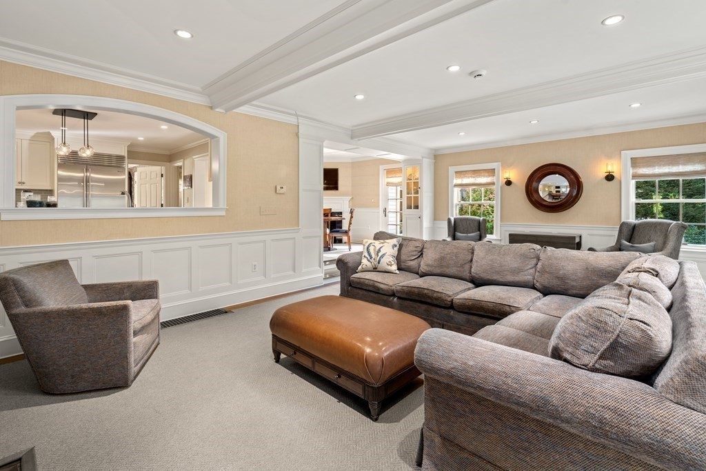 84 Old Colony Road Wellesley, MA 02481 - Photo 8 of 39 a living room with furniture and a clock