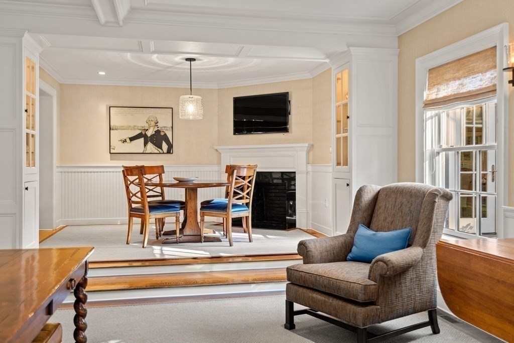 84 Old Colony Road Wellesley, MA 02481 - Photo 10 of 39 a living room with fireplace furniture and a flat screen tv