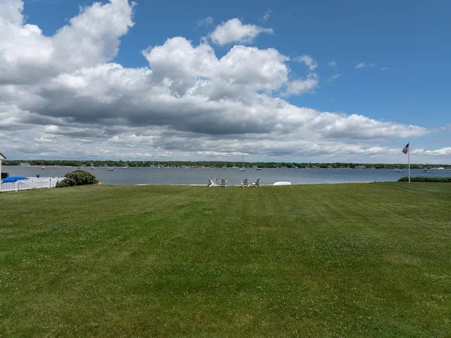 a view of a lake from a yard