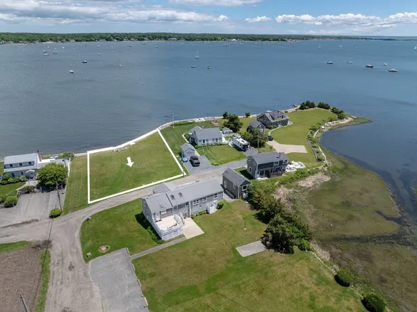 an aerial view of a house with a swimming pool