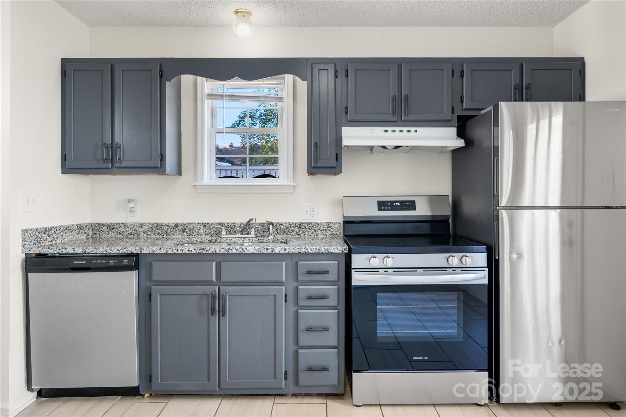 608 Bethpage Road Kannapolis, NC 28081 - Photo 11 of 37 a kitchen with appliances cabinets and a counter top space