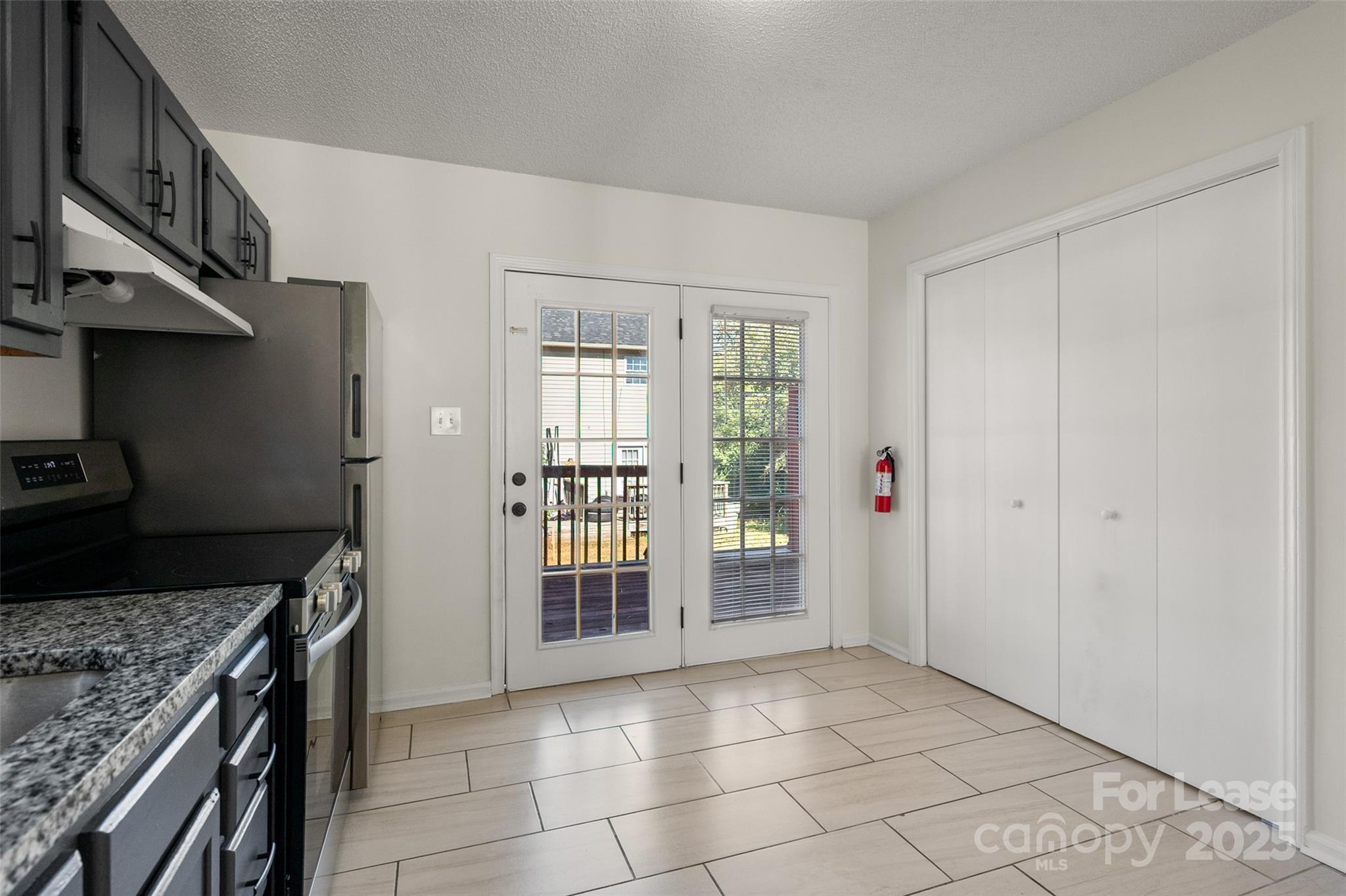 608 Bethpage Road Kannapolis, NC 28081 - Photo 13 of 37 a kitchen with stainless steel appliances granite countertop a stove and a sink