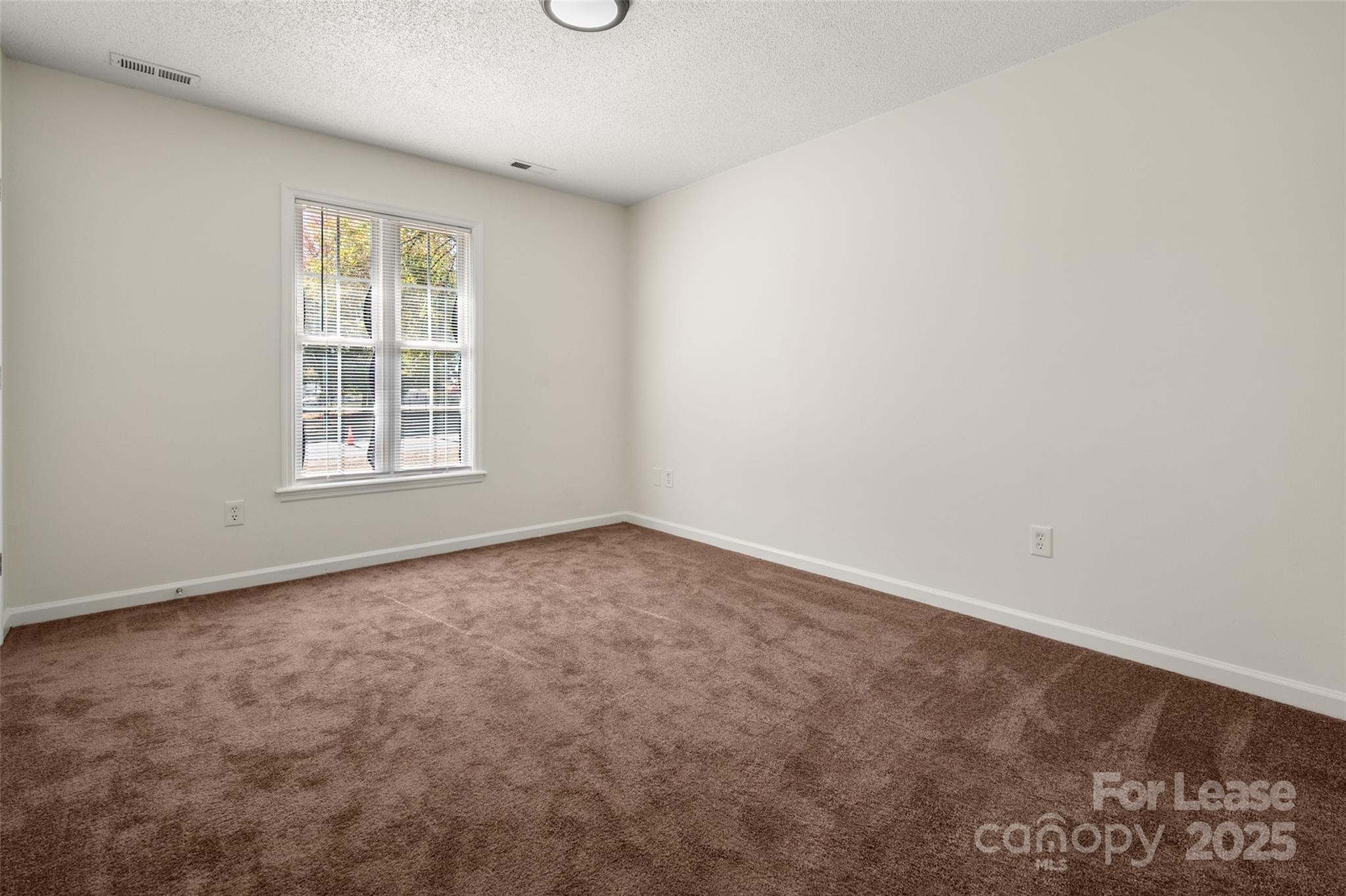608 Bethpage Road Kannapolis, NC 28081 - Photo 22 of 37 an empty room with a window