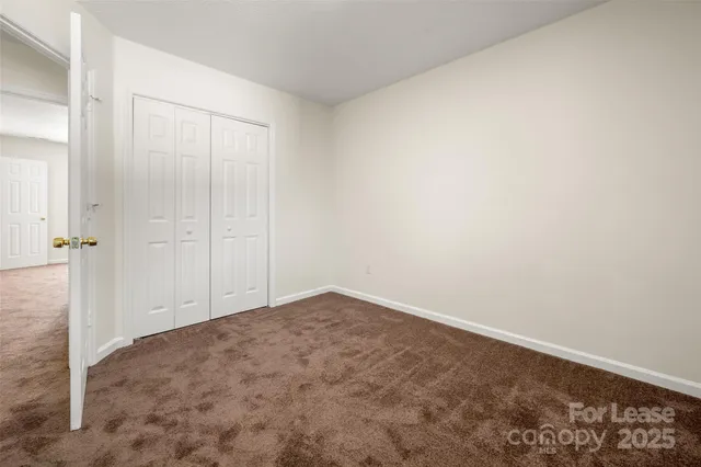an empty room with an entryway