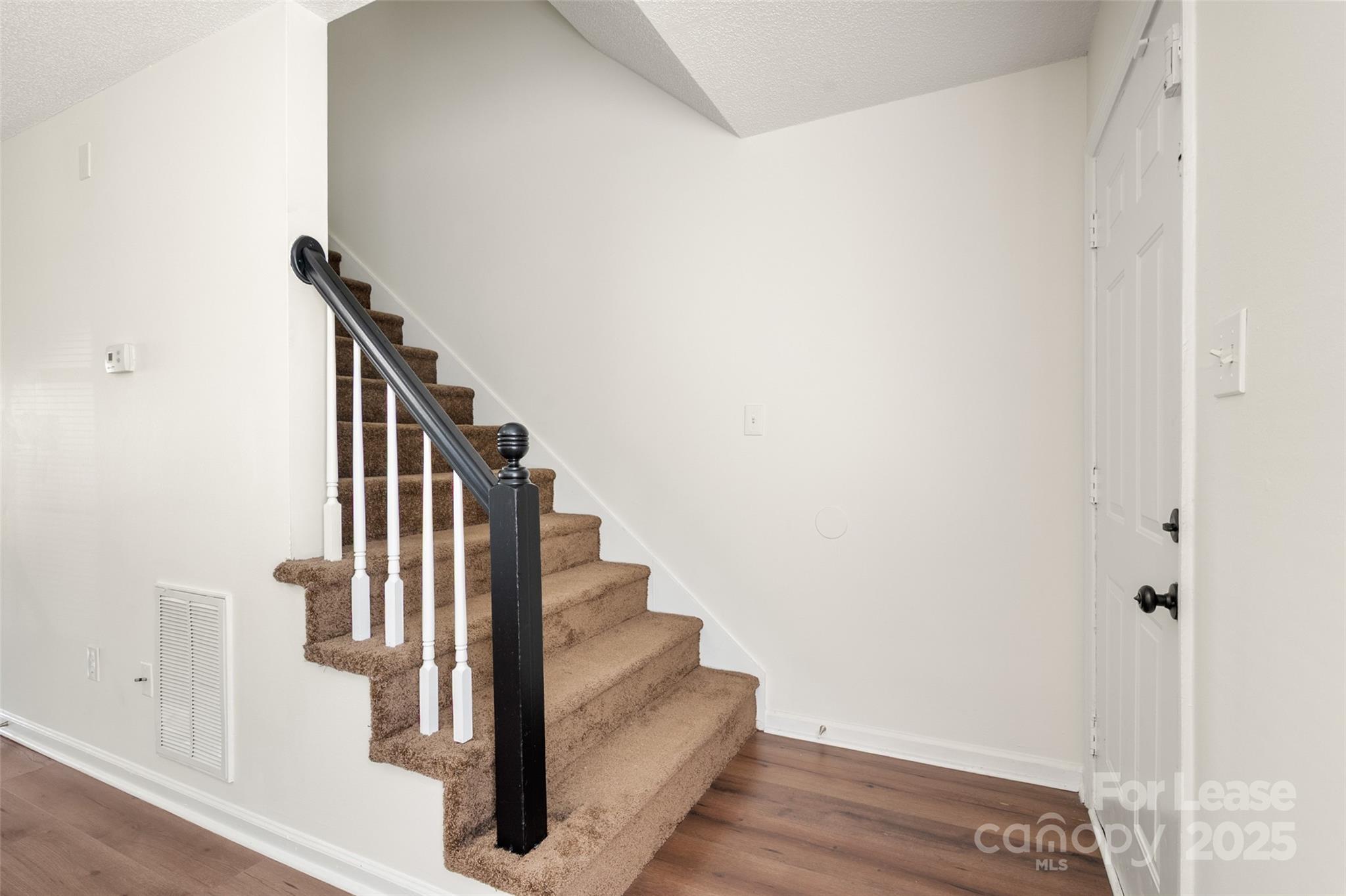 608 Bethpage Road Kannapolis, NC 28081 - Photo 3 of 37 a view of entryway and hall with wooden floor