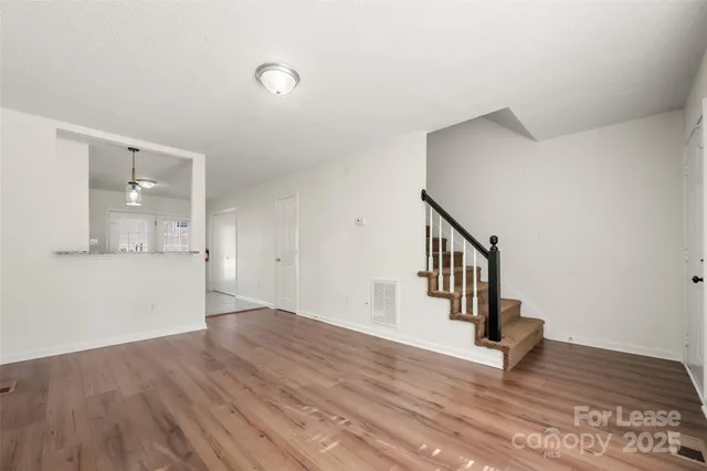 a view of entryway with wooden floor