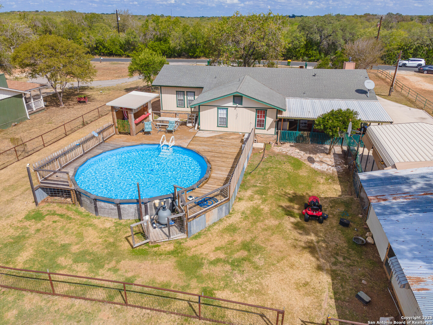 10544 Macaway Road Adkins, TX 78101 - Photo 11 of 40 an aerial view of a house having swimming pool