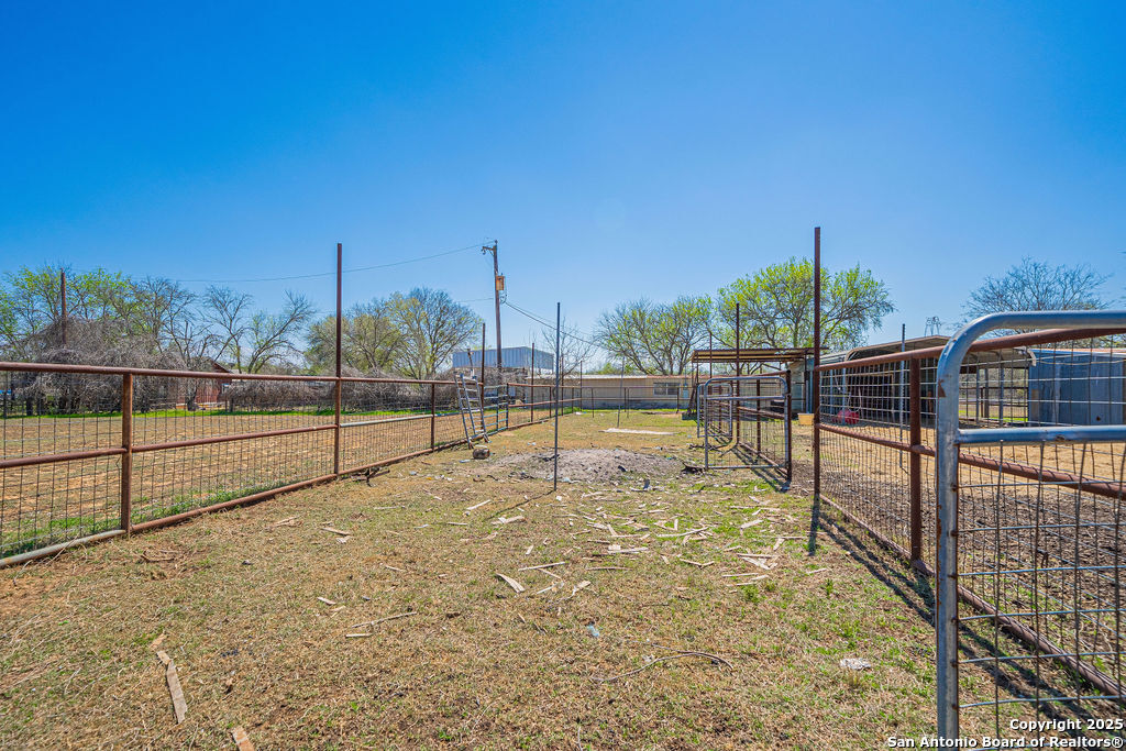 10544 Macaway Road Adkins, TX 78101 - Photo 20 of 40 a view of a backyard