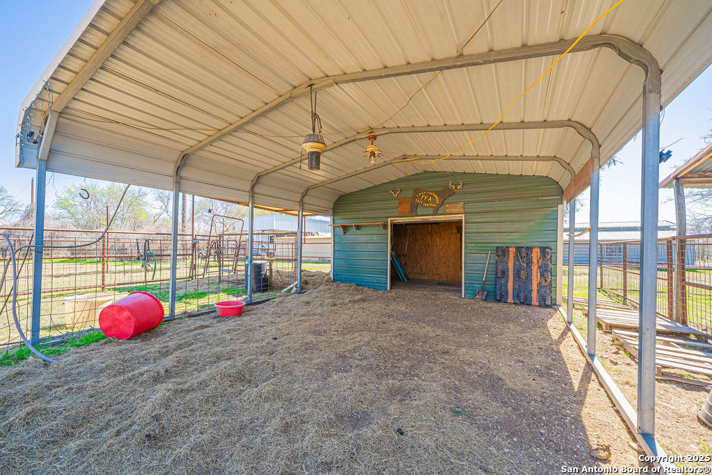 10544 Macaway Road Adkins, TX 78101 - Photo 21 of 40 a view of a garage