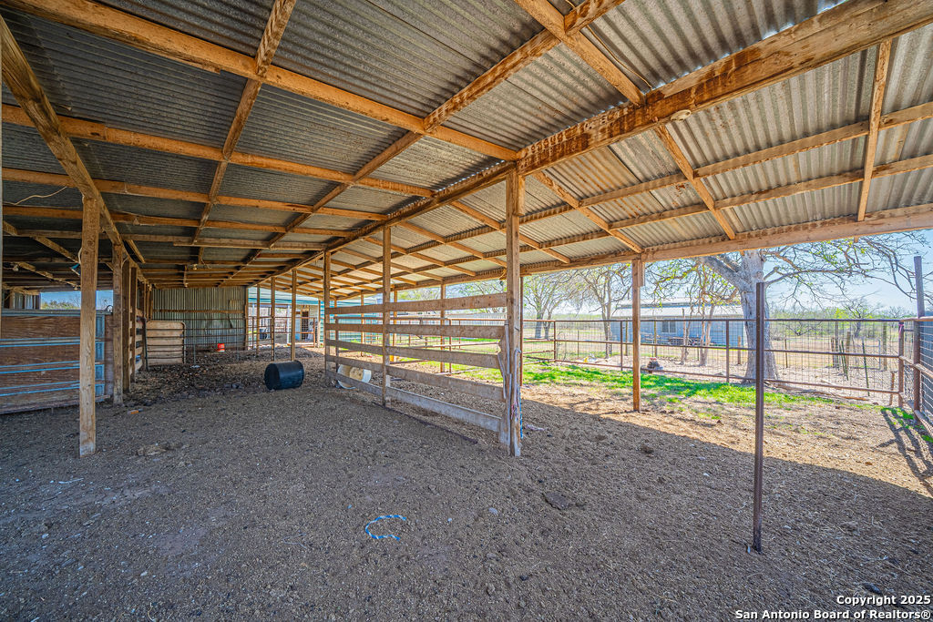 10544 Macaway Road Adkins, TX 78101 - Photo 23 of 40 a view of a room with wooden walls