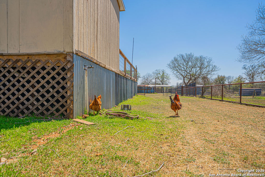 10544 Macaway Road Adkins, TX 78101 - Photo 25 of 40 a view of a backyard