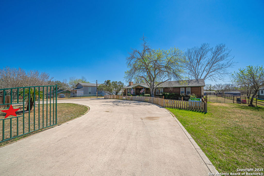 10544 Macaway Road Adkins, TX 78101 - Photo 4 of 40 a view of swimming pool with a yard