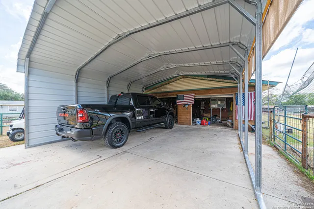 a view of a patio with a table chairs and balcony