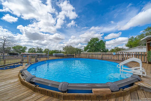 a view of outdoor space with wooden deck
