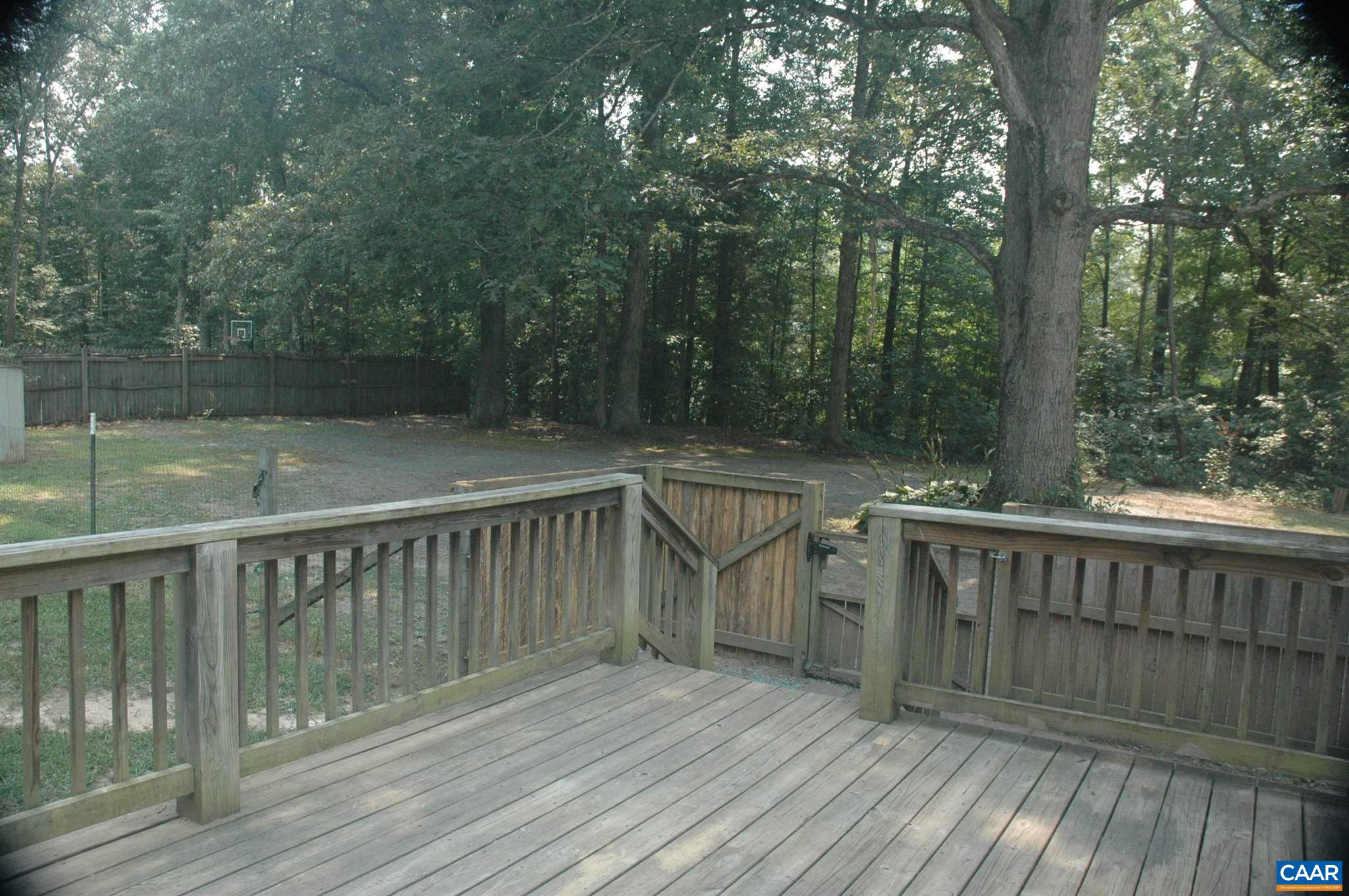 3396 Cedar Lane Road Kents Store, VA 23084 - Photo 12 of 50 a view of deck with patio and yard