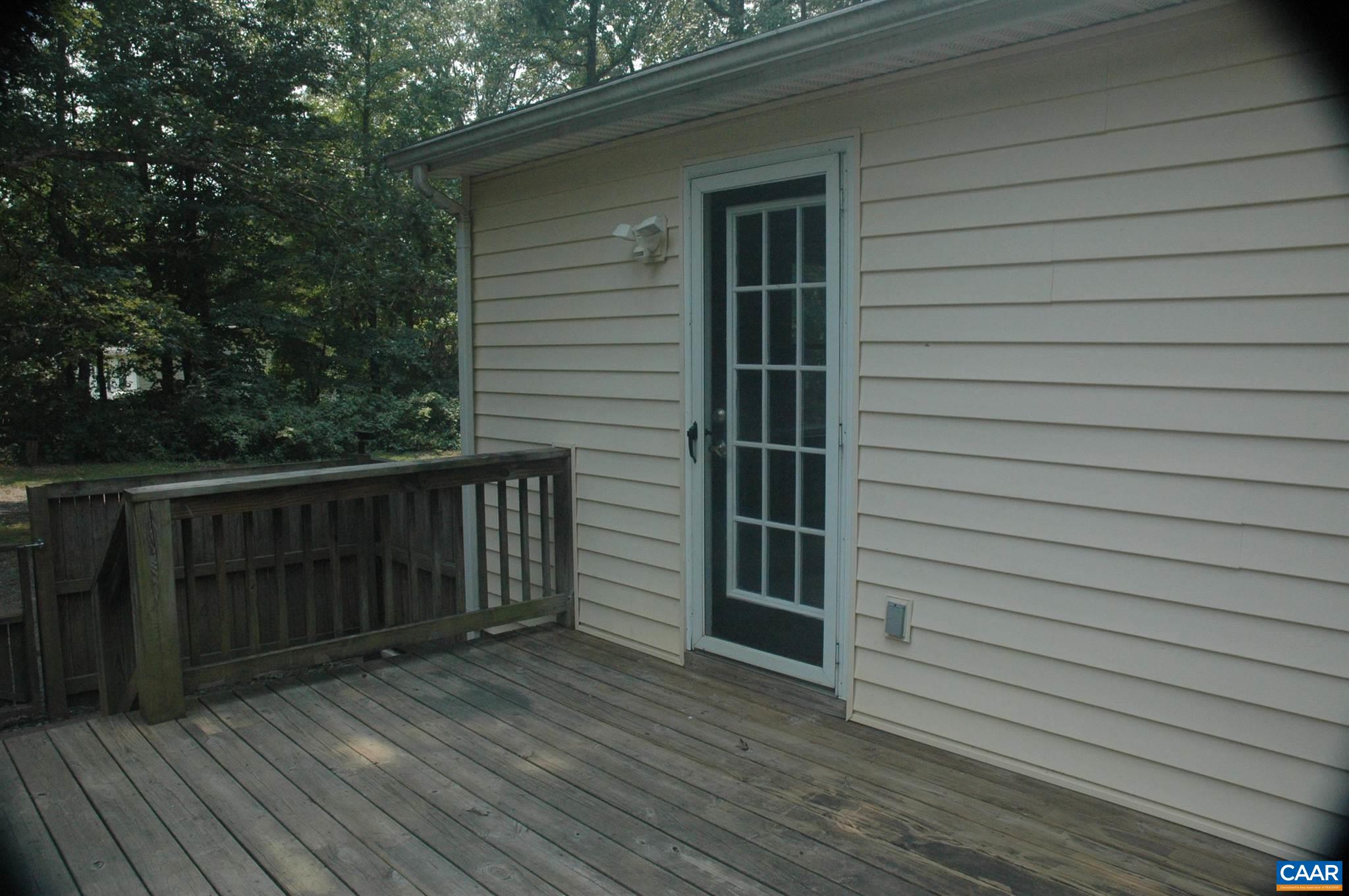 3396 Cedar Lane Road Kents Store, VA 23084 - Photo 13 of 50 a view of a house with wooden deck